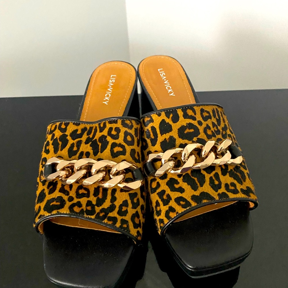 Lisa and Vicky animal print platform slides